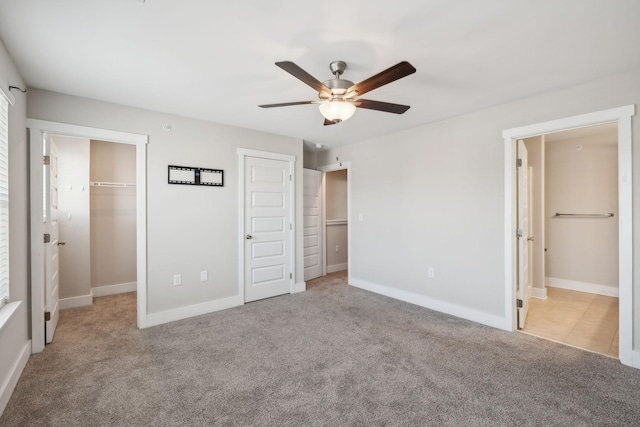 7026 Magnolia Crossings, Spring Hill, TN 37174 - unfurnished bedroom with carpet flooring, baseboards, and ceiling fan