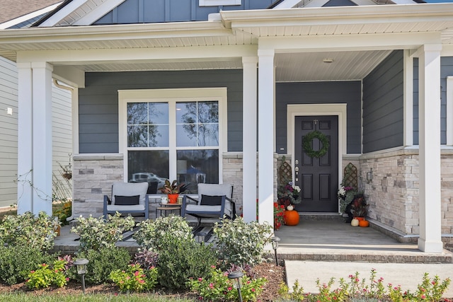 doorway to property with a porch