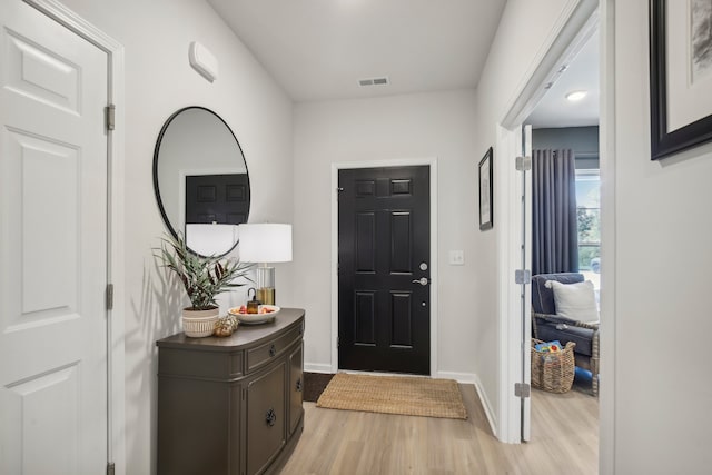 entrance foyer with light wood-type flooring