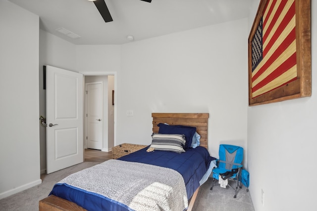 carpeted bedroom featuring ceiling fan