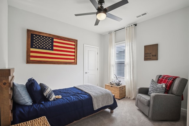 carpeted bedroom with ceiling fan