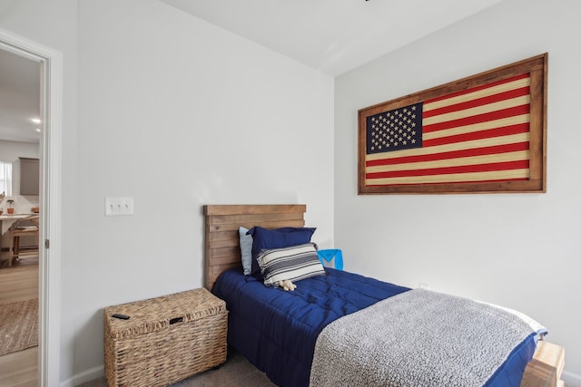 bedroom featuring hardwood / wood-style flooring