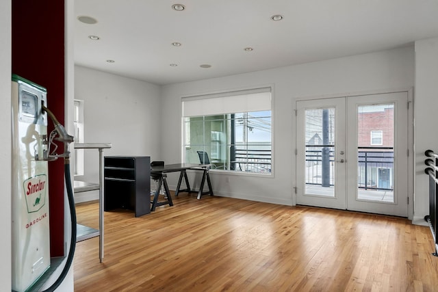 doorway to outside featuring french doors and hardwood / wood-style flooring