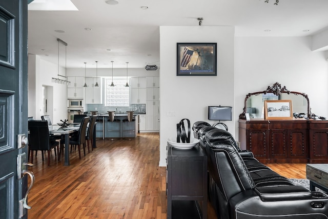 living room featuring dark hardwood / wood-style flooring