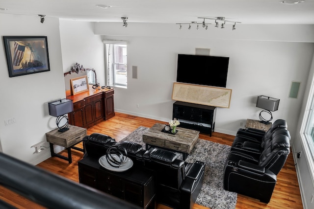 living room with light hardwood / wood-style floors