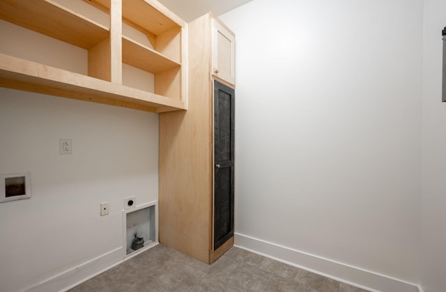 laundry room featuring hookup for an electric dryer, hookup for a washing machine, and tile patterned floors