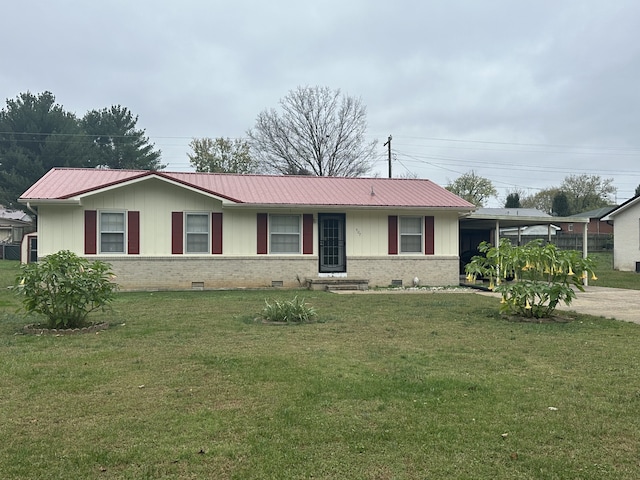 ranch-style house with a front lawn and a carport