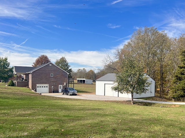 view of yard featuring a garage