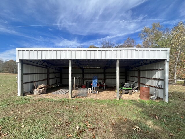 view of outdoor structure with a lawn