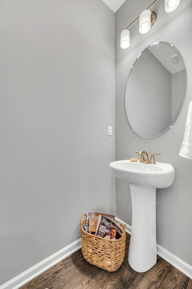 bathroom featuring hardwood / wood-style floors and sink