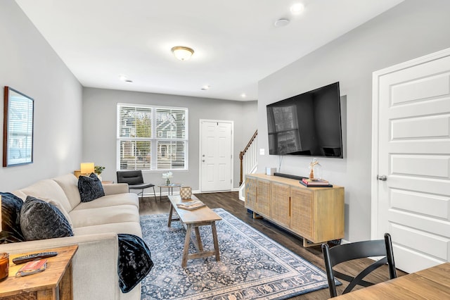 living room featuring dark hardwood / wood-style floors