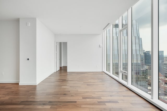 unfurnished room featuring light hardwood / wood-style flooring