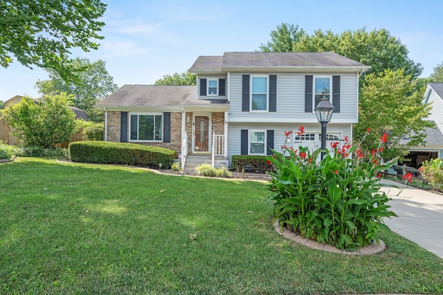 tri-level home featuring a front lawn