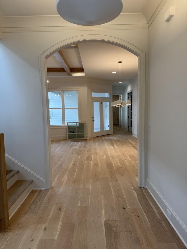 8006 Southvale Blvd, Franklin, TN 37064 - hallway featuring arched walkways, crown molding, light wood finished floors, baseboards, and beam ceiling