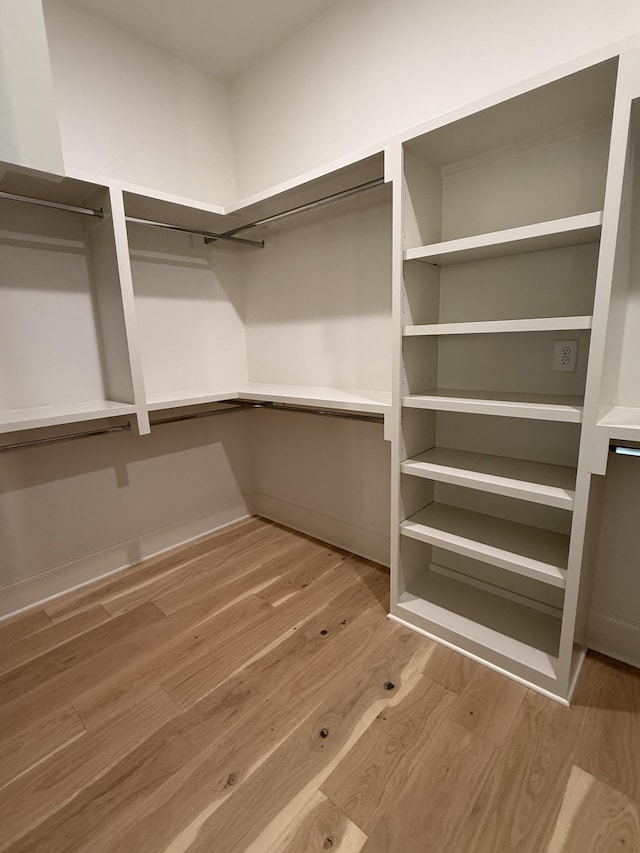 8006 Southvale Blvd, Franklin, TN 37064 - walk in closet featuring wood finished floors
