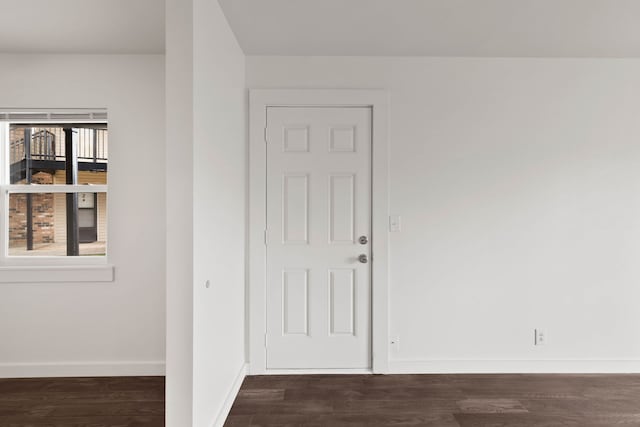 interior space with dark wood-type flooring