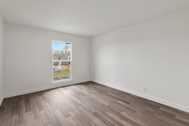 empty room featuring hardwood / wood-style flooring