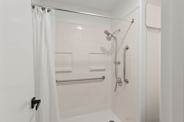 bathroom with a shower with curtain