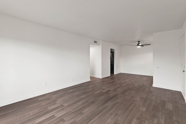 unfurnished room featuring dark hardwood / wood-style flooring and ceiling fan