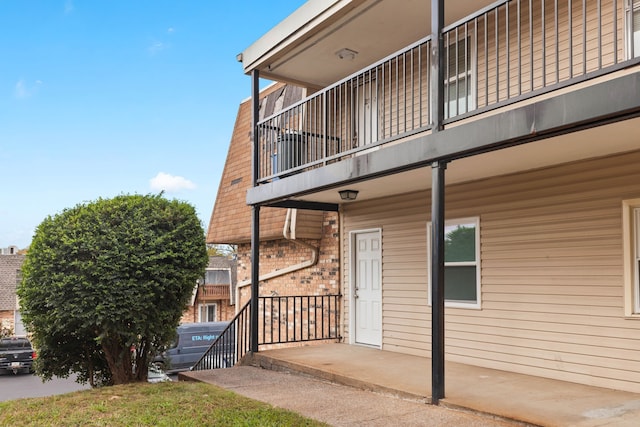 doorway to property with a balcony