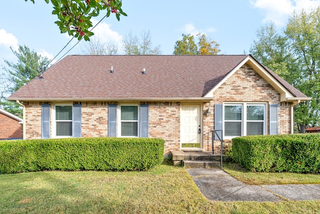 single story home with a front yard