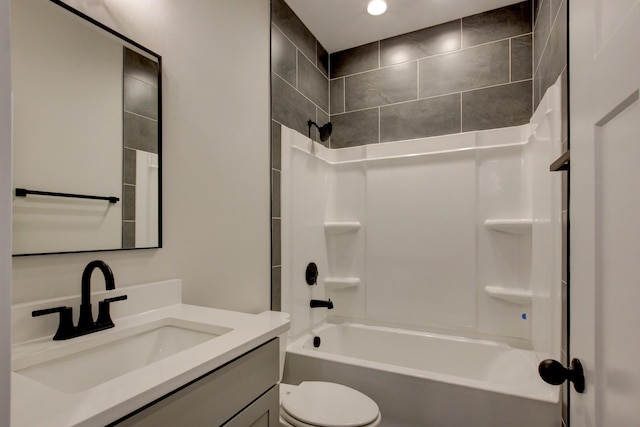 full bathroom with vanity, toilet, and washtub / shower combination