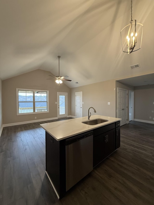 kitchen featuring sink, dark wood-type flooring, an island with sink, decorative light fixtures, and stainless steel dishwasher