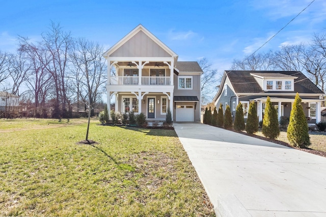 view of front of house featuring a balcony, a ceiling fan, driveway, board and batten siding, and a front yard