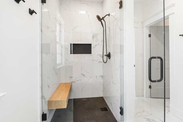 full bathroom featuring marble finish floor and a marble finish shower