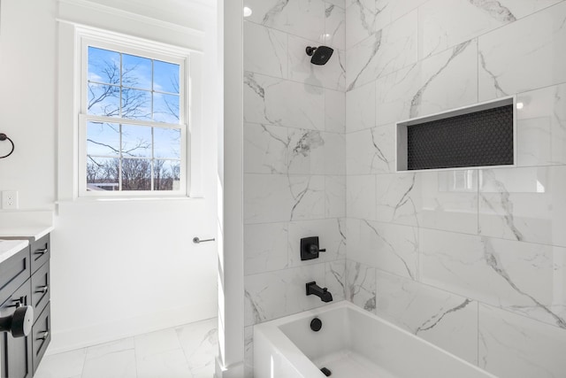 bathroom featuring marble finish floor, shower / bath combination, vanity, and baseboards