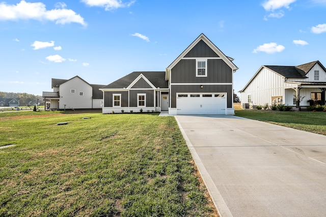 view of front facade with a garage and a front lawn