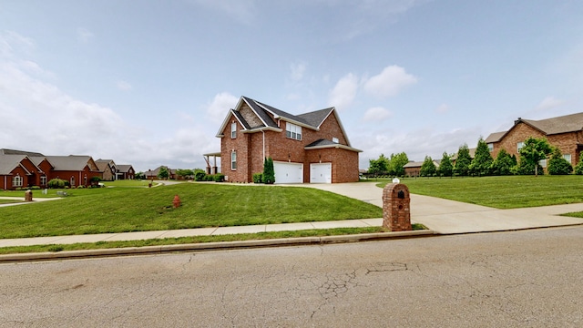 front of property with a garage and a front lawn