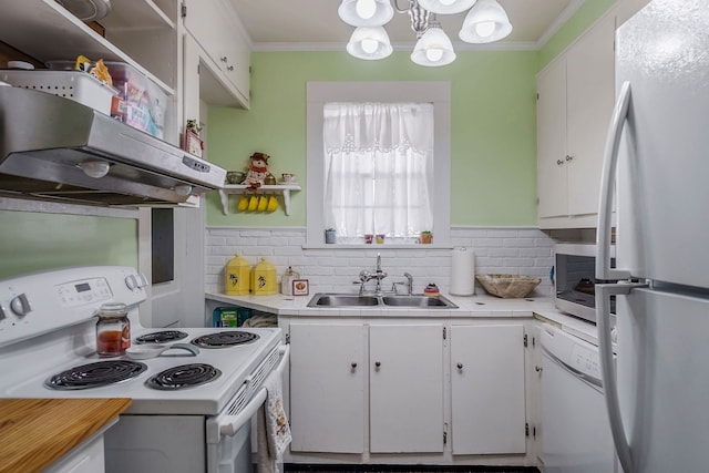 kitchen featuring white cabinetry, white appliances, sink, and ventilation hood