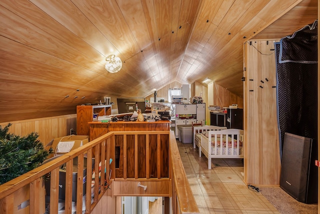 bedroom with wood ceiling, wooden walls, and vaulted ceiling