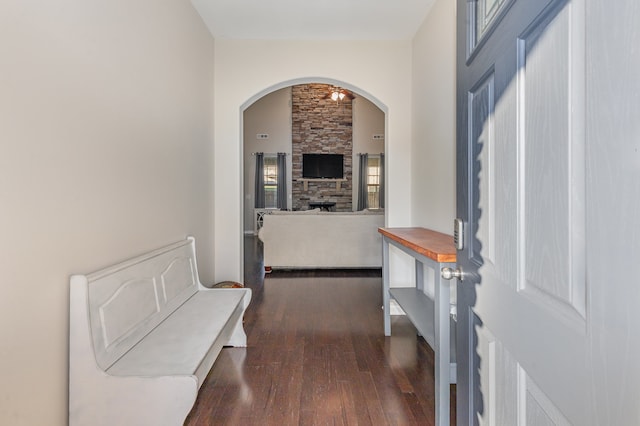 hallway with dark wood-type flooring