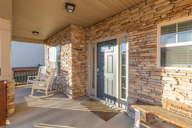 property entrance with a porch