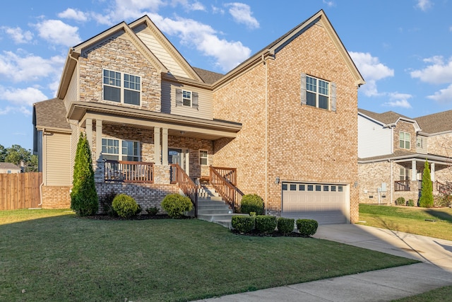 craftsman-style house featuring a porch, a garage, and a front yard