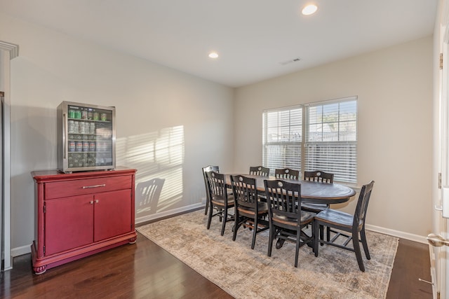 dining room featuring dark hardwood / wood-style flooring