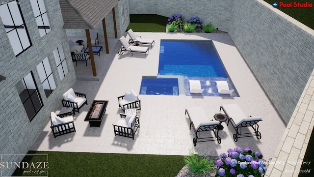 view of pool featuring an in ground hot tub, a fire pit, and a patio area