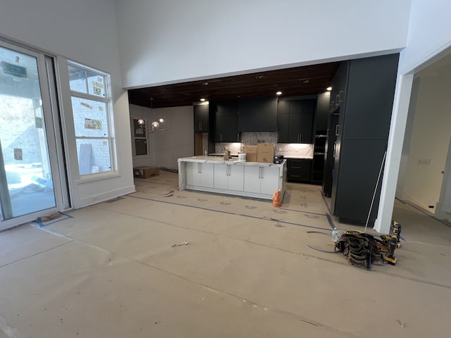 kitchen with a towering ceiling