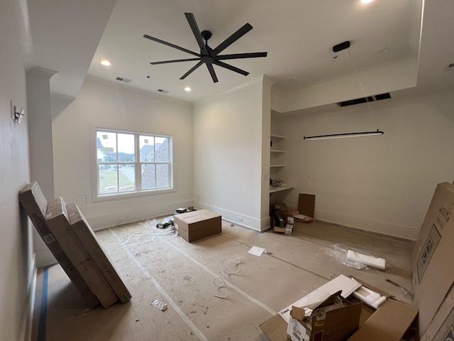 interior space with ceiling fan