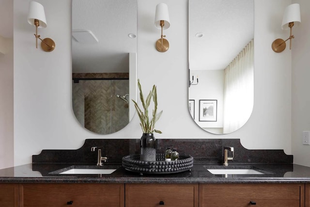 bathroom with an enclosed shower and vanity