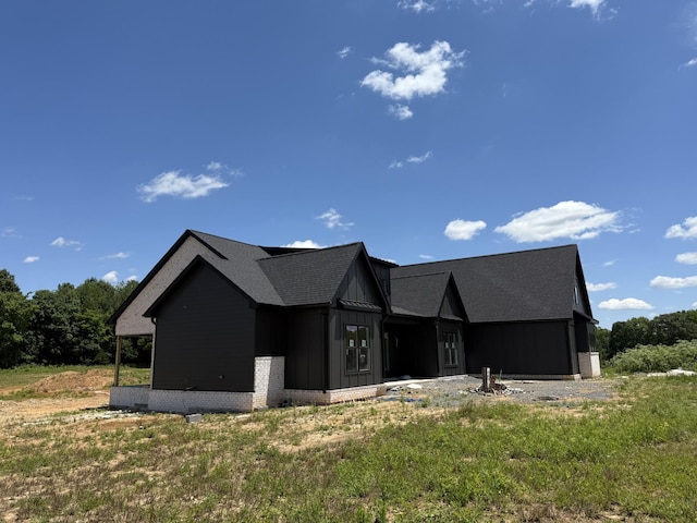 17 Solitude Way, Clarksville, TN 37043 - view of front of house featuring board and batten siding and roof with shingles