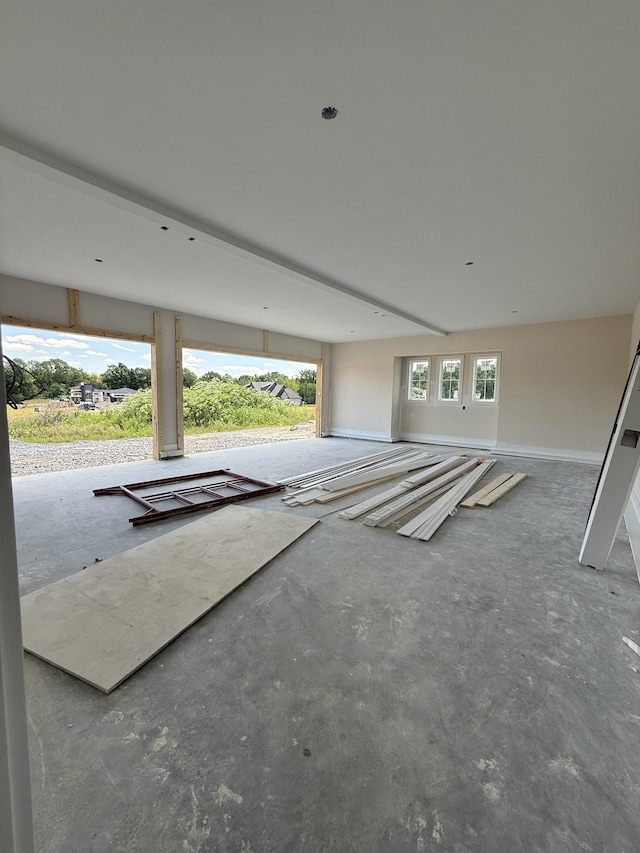 17 Solitude Way, Clarksville, TN 37043 - unfurnished living room with concrete floors