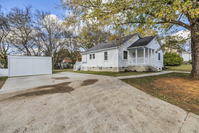 view of home's exterior featuring covered porch