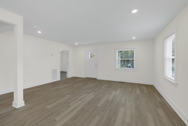 unfurnished living room featuring light hardwood / wood-style flooring