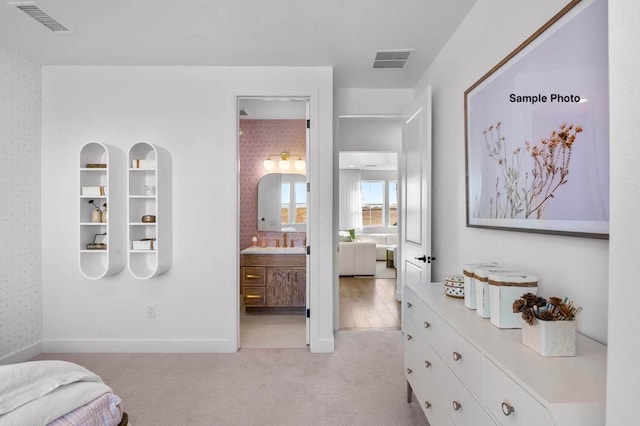 18 Solitude Way, Clarksville, TN 37043 - bedroom featuring light colored carpet and ensuite bathroom