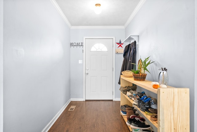 doorway to outside featuring ornamental molding and dark hardwood / wood-style floors