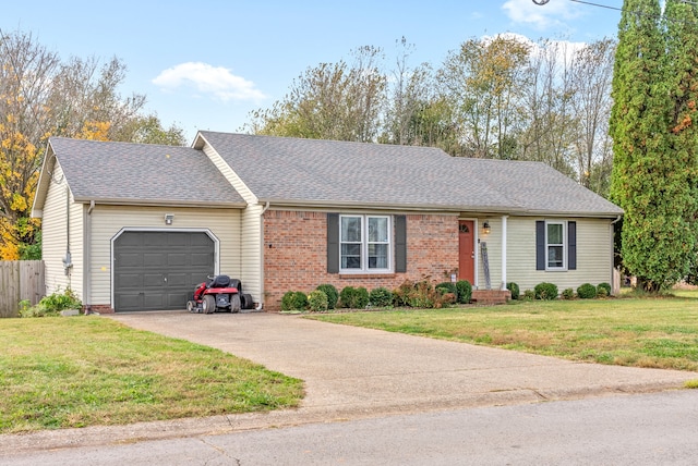 ranch-style house featuring a garage and a front lawn