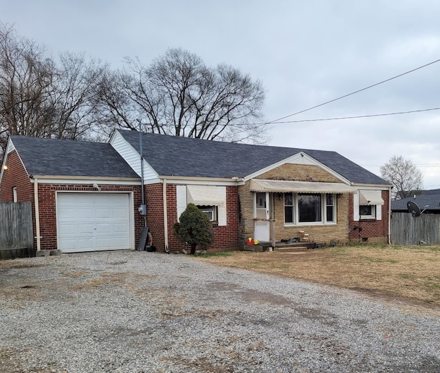 single story home with a garage